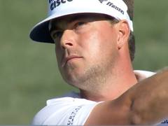 
      
      Mitchell closes with eagle to take 2-shot lead
      
      