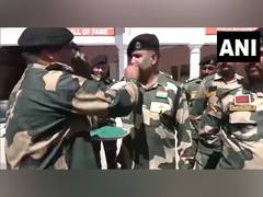 
      
      J-K: BSF jawans smear fellow comrades with colours 
      
      
