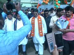 
      
      Tripura CM Manik Saha conducts door-to-door campaign in Bamutia
      
      
