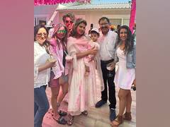 
      
      Priyanka, Nick enjoy Holi with daughter Malti
      
      