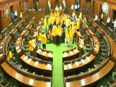 
      
      AAP MLAs turn up in 'Mai Bhi Kejriwal' T shirts at Delhi Assembly
      
      