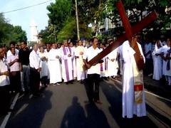 
      
      Christians mark Good Friday with solemn processions
      
      