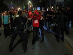 
      
      Hostage's kin dragged by Israeli police outside Netanyahu’s home
      
      