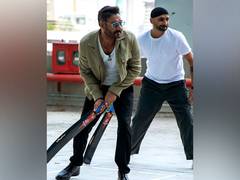 
      
      Ajay Devgn enjoys cricket session with Harbhajan Singh
      
      