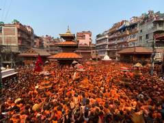 
      
      Soaked in orange, Nepali town welcomes New Year in colour
      
      