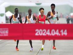 
      
      Chinese runner's victory in Beijing Half Marathon sparks probe
      
      