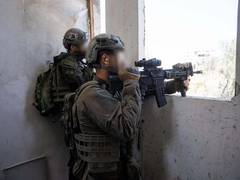
      
      Israeli airstrikes hit 40 Hamas targets in central Gaza
      
      