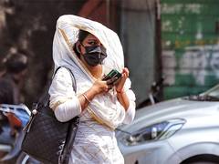
      
      Braving heat, citizens turn up in large numbers to vote
      
      