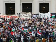 
      
      Protesters drape Palestinian flag at venue of White House event
      
      