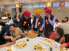 
      
      'Overseas Friends of Ram Mandir' US distribute 101 kg Laddoos
      
      