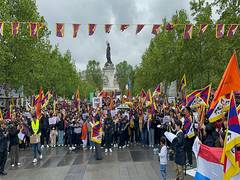 
      
      Tibet, Xinjiang campaigners protest as Xi visits France
      
      
