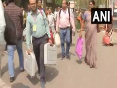 
      
      Madhya Pradesh: Polling parties dispatched with EVMs to booths
      
      