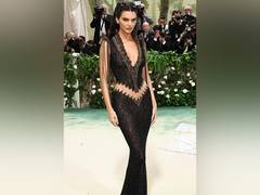
      
      Kendall Jenner dazzles in Alexander McQueen dress at Met Gala
      
      