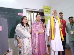 
      
      Union Minister Parshottam Rupala casts his vote in his village 
      
      