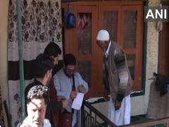 
      
      J-K: Centenarian cast first home vote in Srinagar
      
      