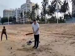 
      
      Uttarakhand CM Dhami plays cricket at Juhu beach in Mumbai
      
      