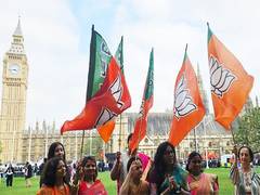 
      
      Indian women gathers in traditional attire outside UK Parliament
      
      