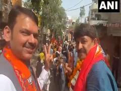 
      
      Maharashtra Dy CM holds roadshow in Delhi for BJP's Manoj Tiwari
      
      
