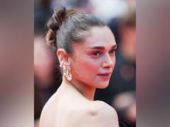 
      
      Cannes: Aditi grabs eyeballs on red carpet in monochrome gown
      
      