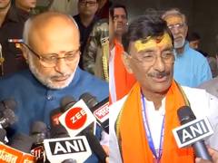 
      
       LS Polls: Jharkhand Governor CP Radhakrishnan and BJP candidate 
      
      