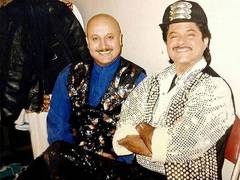 
      
       Anil congratulates Anupam on completing 40 years in cinema 
      
      