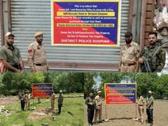 
      
      Police attaches illegal properties from drug peddlers in Shopian
      
      