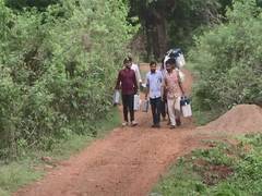 
      
      Odisha: Officials traverse tough terrain to reach polling station
      
      