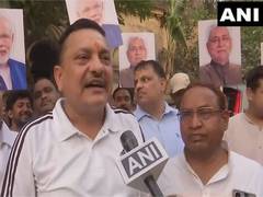 
      
      JDU leader Arvind Singh makes laddus ahead of LS poll results
      
      