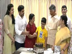
      
      TDP chief Chandrababu Naidu celebrates with family 
      
      