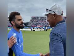 
      
      Kohli, Bumrah meet legendary basketball player John Starks 
      
      