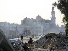 
      
      Israel presses attacks on Hamas in Central Gaza
      
      