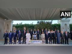 
      
      Global leaders at 'Outreach Nation' session pose for family photo
      
      