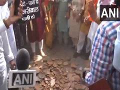 
      
      BJP holds 'Matka Phod' protest against water crisis in Delhi
      
      