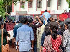 
      
      SFI activists protest against cancellation of UGC NET exam 
      
      