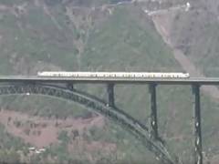 
      
      Railways conduct trial run on world's highest Chenab rail bridge
      
      