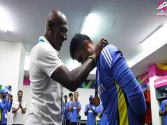 
      
      Richards presents Suryakumar with 'Fielder of the Match' medal
      
      