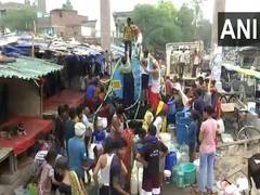 
      
      Residents queue for tankers amid ongoing shortage in Delhi
      
      