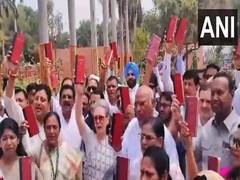 
      
      INDIA bloc leaders protest holding Constitution copy
      
      