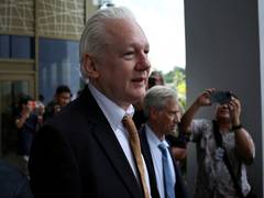 
      
      Julian Assange walks out of courtroom as free man after plea deal
      
      