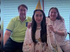 
      
      Karisma Kapoor shares adorable then-and-now pics with parents
      
      