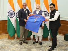 
      
      Roger Binny, Jay Shah gift 'NAMO 1' jersey to PM Modi
      
      
