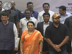 
      
      Eknath Shinde, Devendra Fadnavis felicitate Rohit Sharma
      
      