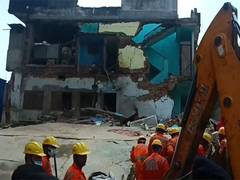 
      
      Two rescued, many feared trapped after building collapse
      
      