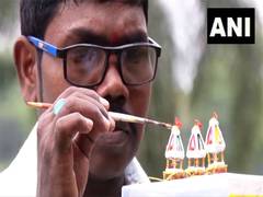 
      
      Odisha miniature artist crafts eco-friendly two-inch chariot 
      
      