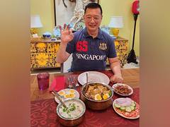 
      
      Singapore envoy Simon Wong makes biryani for first time
      
      