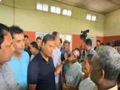 
      
      Assam CM visits flood relief camps; announces houses under PMAY
      
      