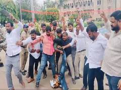 
      
      Students protest at Osmania University demanding postponement
      
      