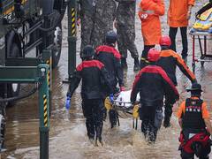 
      
      Four killed as heavy rains lash South Korea
      
      
