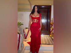 
      
      Anant-Radhika wedding: Kim turns desi girl in red saree
      
      