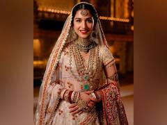 
      
      First look of Radhika Merchant as bride surfaces
      
      